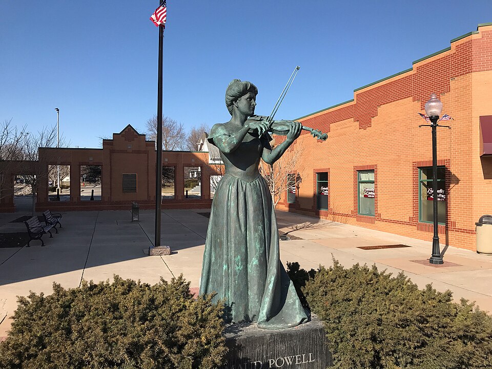 Small business owner updating their website on a laptop